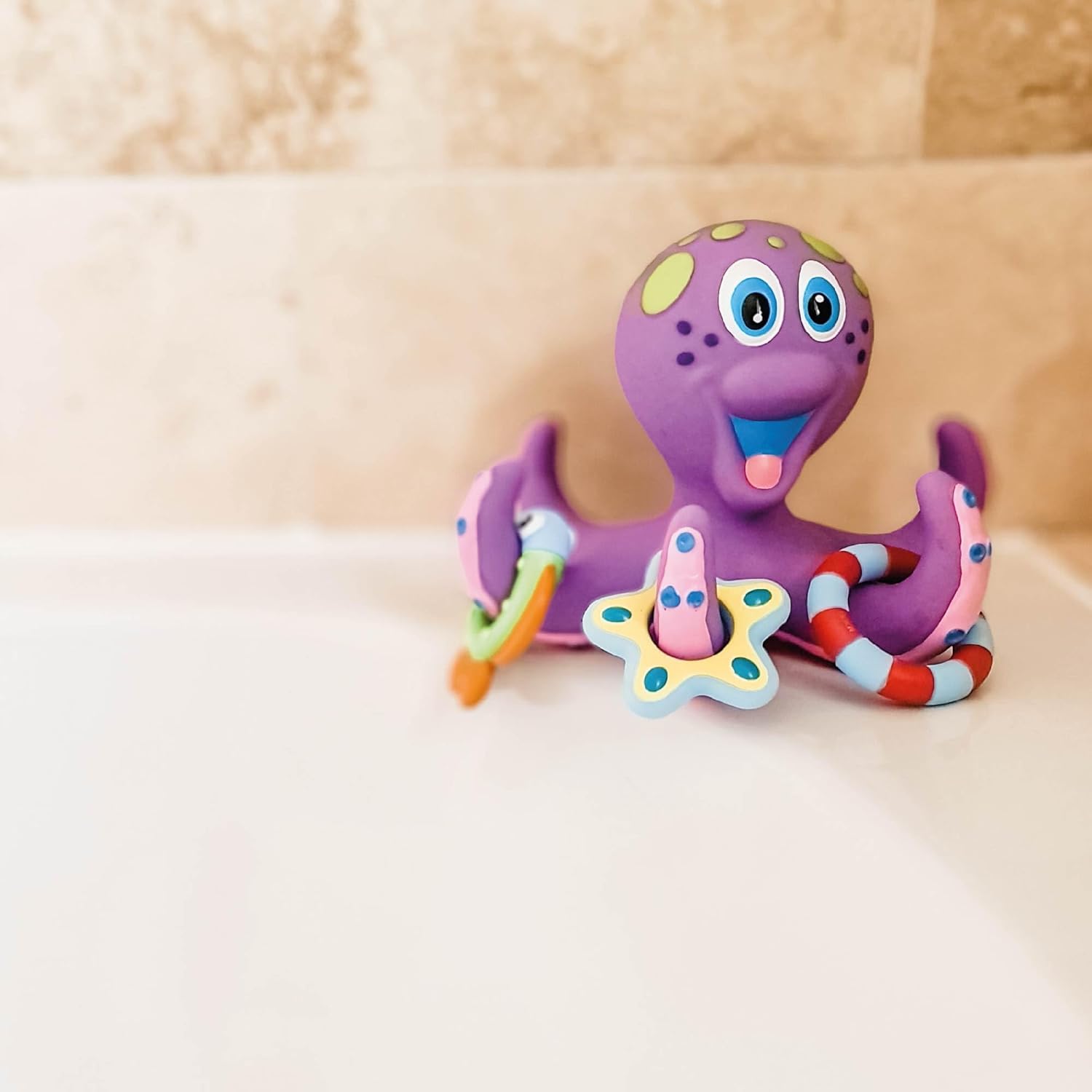 Nuby - Polvo flutuante com 3 anéis para banheira - brinquedos casa de banho bebé interativos e sensoriais - estimula a coordenação mão-olho, a destreza e o jogo criativo - adequado desde 18 meses