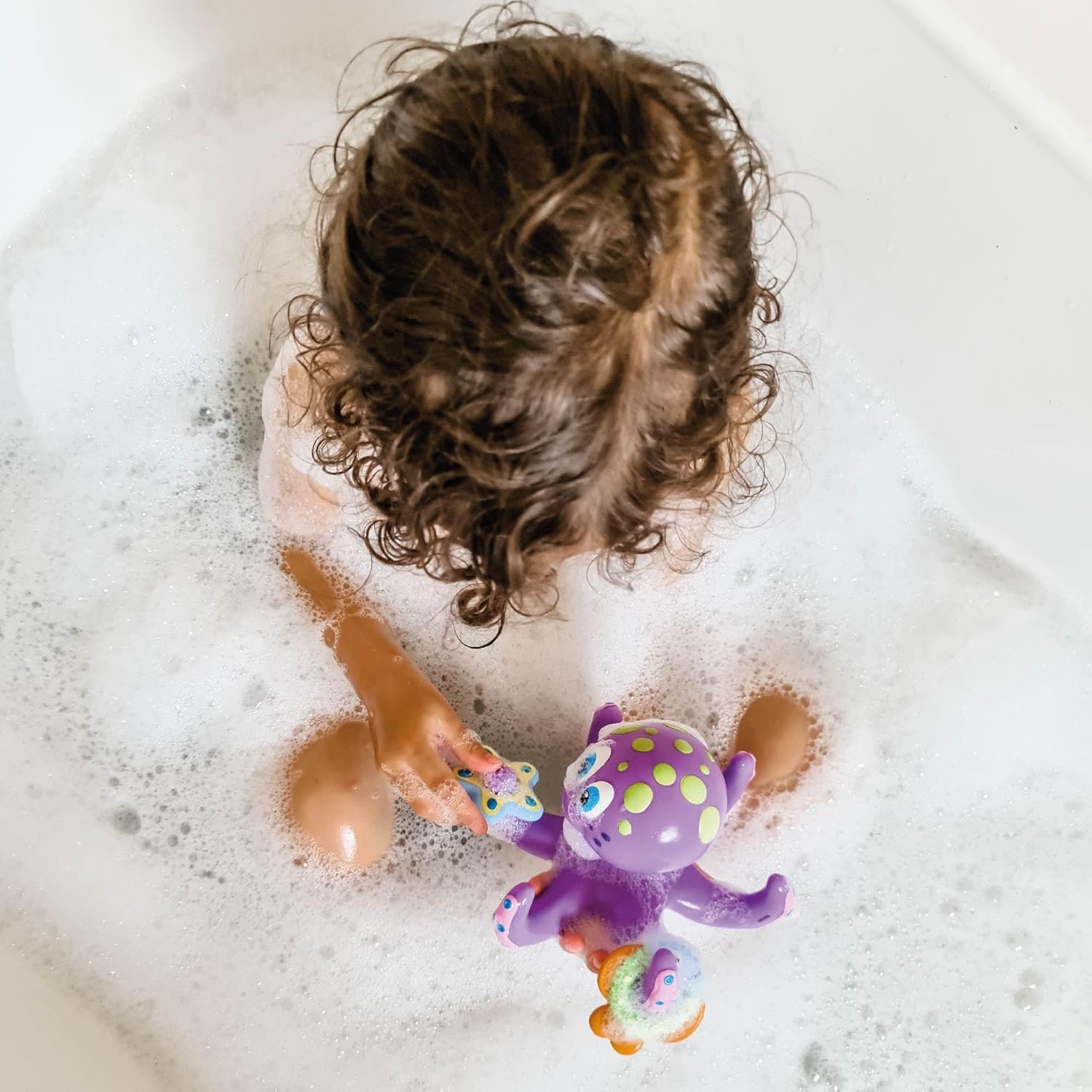 Nuby - Polvo flutuante com 3 anéis para banheira - brinquedos casa de banho bebé interativos e sensoriais - estimula a coordenação mão-olho, a destreza e o jogo criativo - adequado desde 18 meses