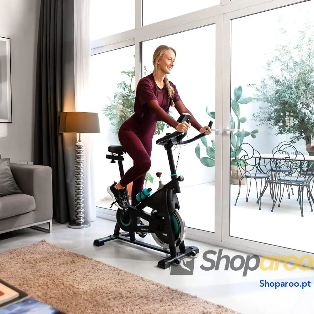 Bicicleta estática Indoor DrumFit volante de inércia 6 a 13 kg resistência manual monitor LCD pulsómetro suporte