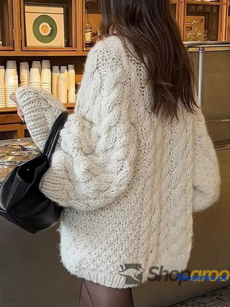 Camisola de gola redonda em tricô entrançado
