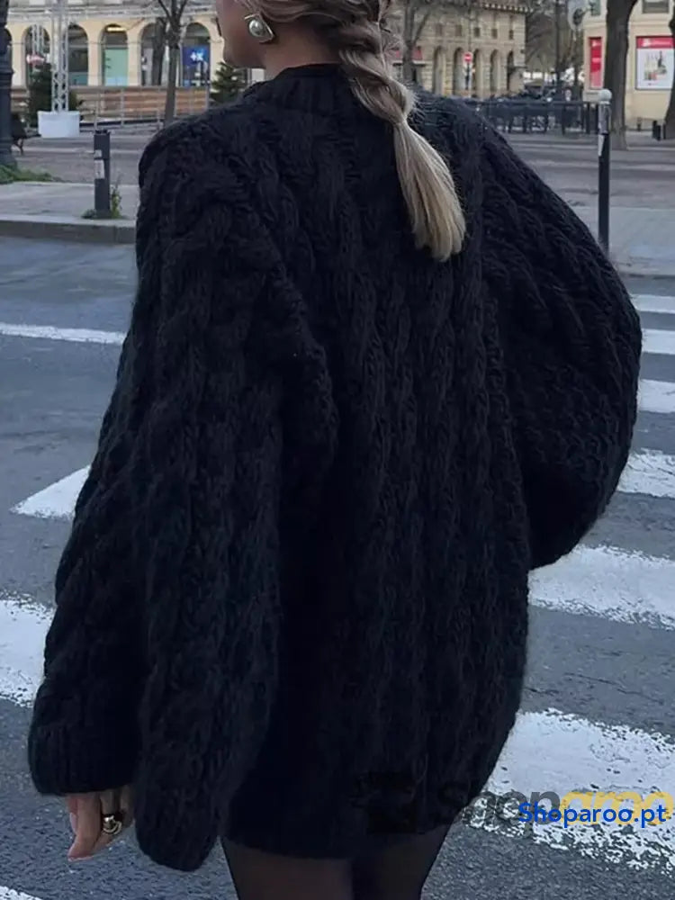 Camisola de gola redonda em tricô entrançado