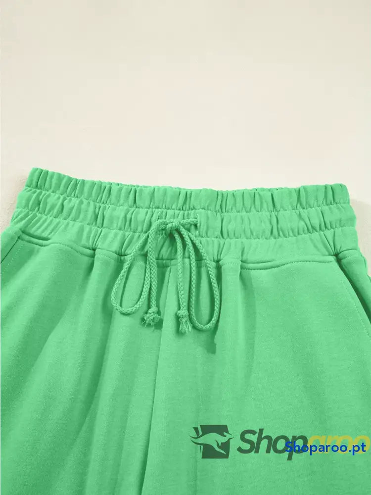 Conjunto de blusa curta com manga abalonada e ombro descaído calças largas cordão