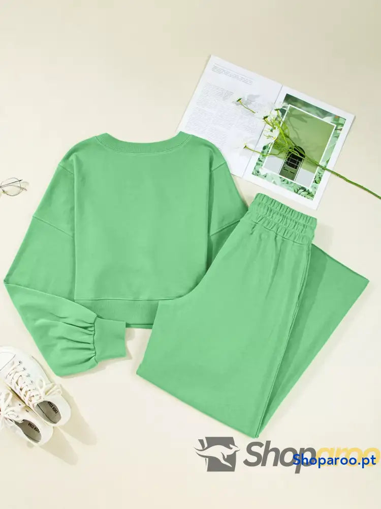 Conjunto de blusa curta com manga abalonada e ombro descaído calças largas cordão