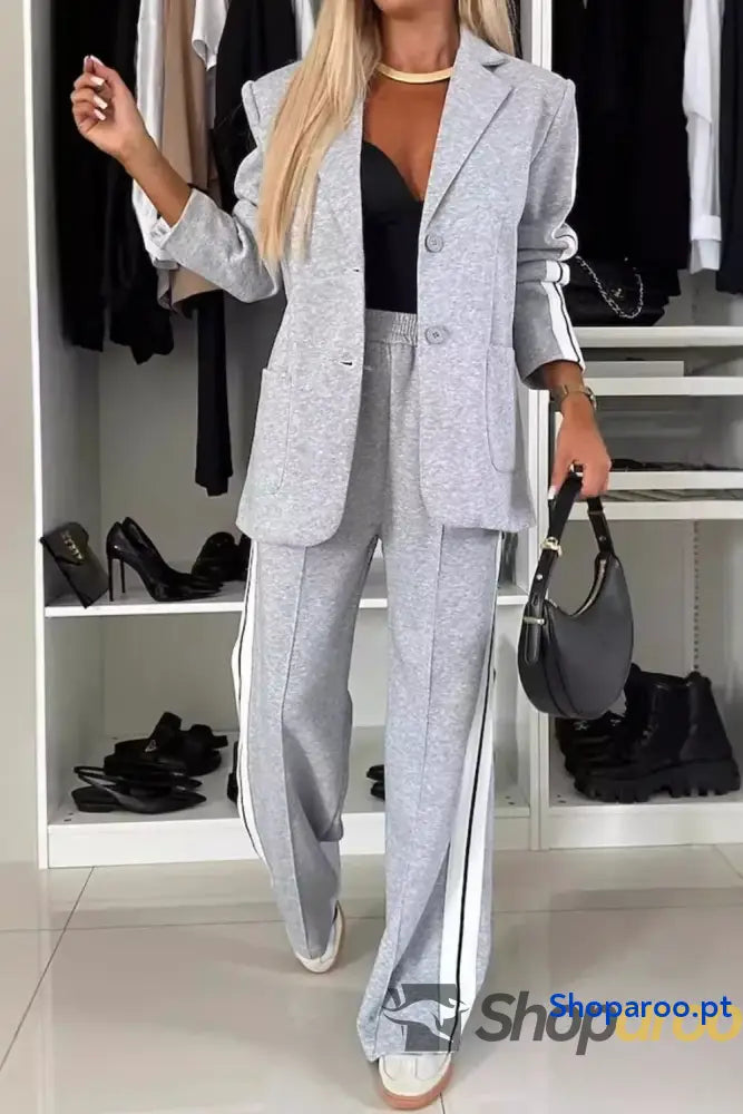 Conjunto de blusa e calças com gola contrastante lapela tamanho grande