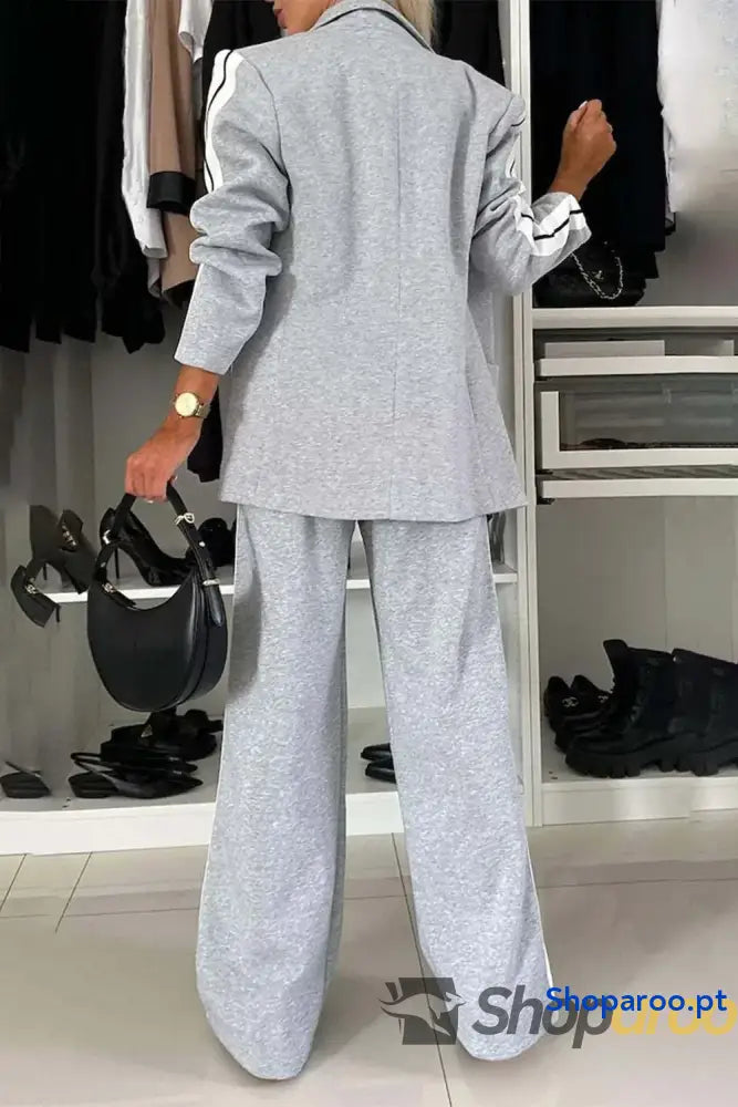 Conjunto de blusa e calças com gola contrastante lapela tamanho grande