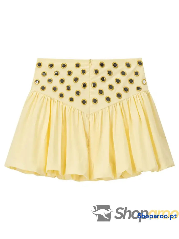 Conjunto de camisola com ilhós e saia bolha
