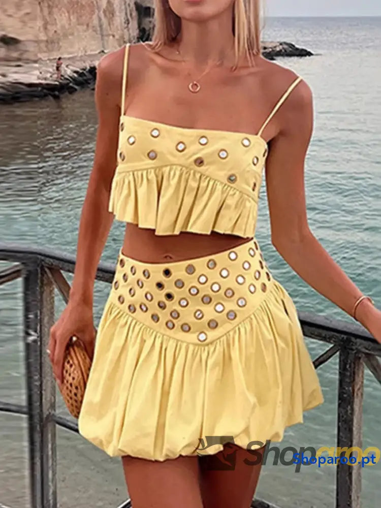 Conjunto de camisola com ilhós e saia bolha