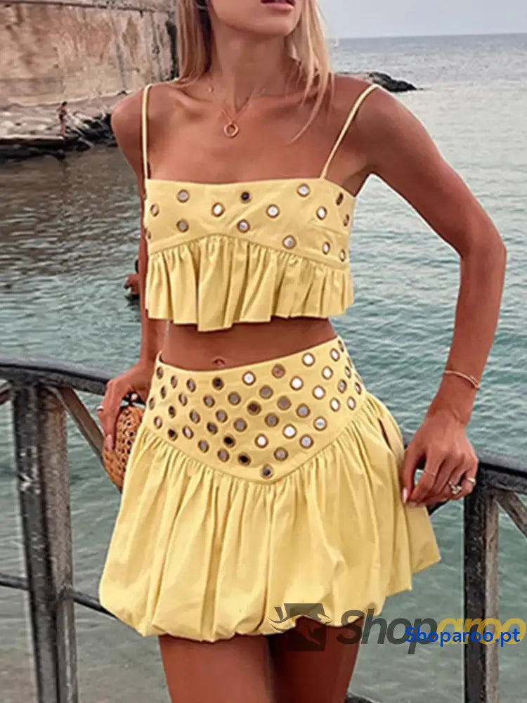 Conjunto de camisola com ilhós e saia bolha