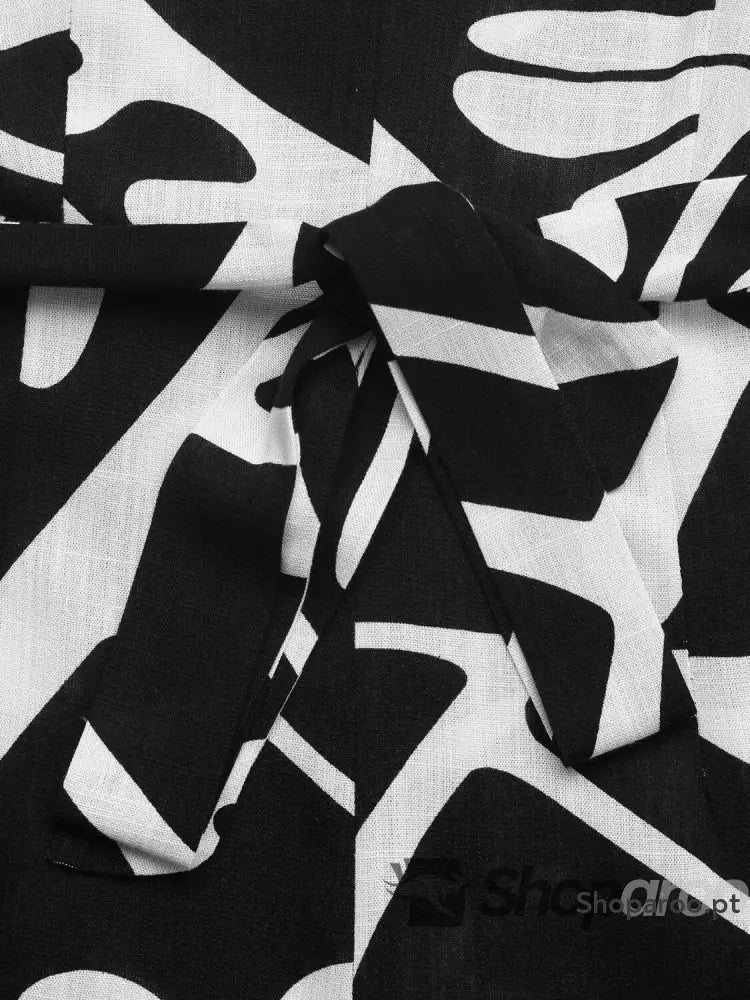 Macacão estampado sem mangas com pernas largas em viscose