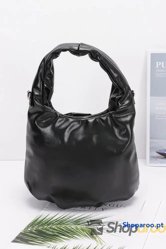 Bolsa metálica com alça grande em forma de flor