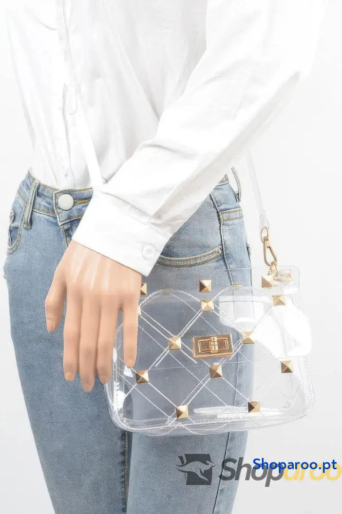 Bolsa estruturada transparente com alça metálica e tons iridescentes