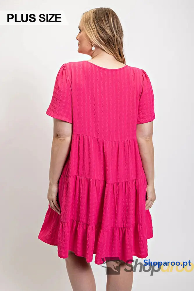 Textured woven tiered dress with tassel tie and pockets