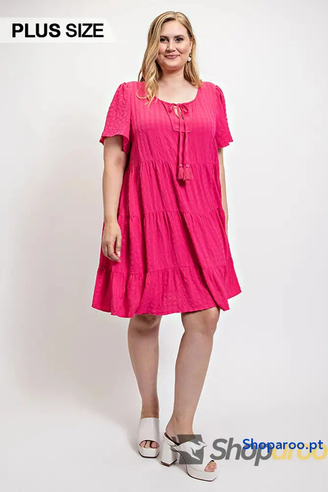 Textured woven tiered dress with tassel tie and pockets