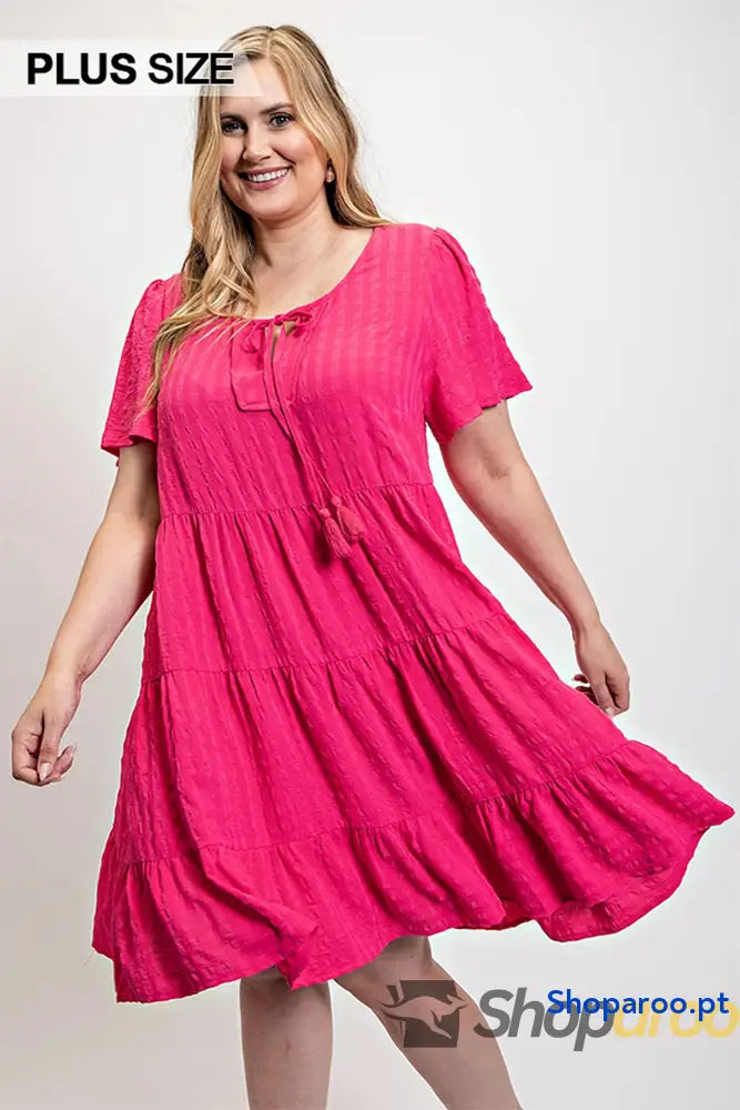 Textured woven tiered dress with tassel tie and pockets