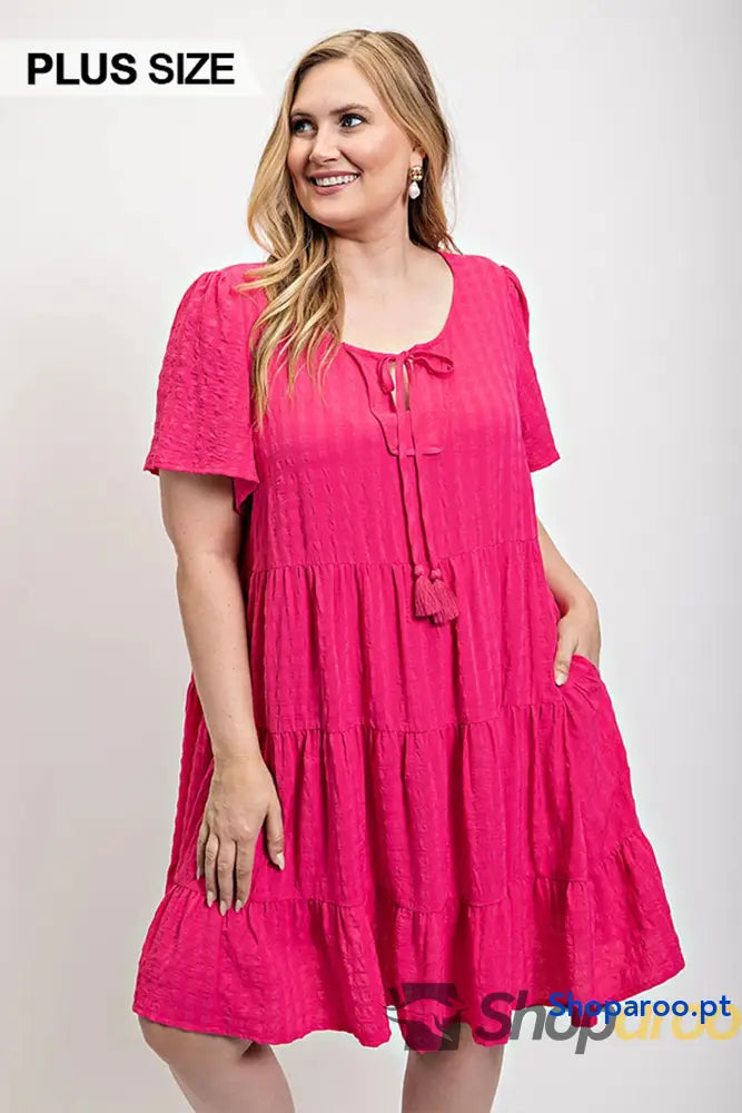 Textured woven tiered dress with tassel tie and pockets